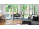 Living room with sliding doors leading to a patio and backyard at 805 Ponce De Leon Ne Ter, Atlanta, GA 30306