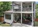 Charming two-story home with a spacious backyard, featuring a covered patio and upper level balcony at 805 Ponce De Leon Ne Ter, Atlanta, GA 30306