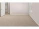 Spacious bedroom featuring a large window for natural light and neutral carpet at 1950 Van Allen Ct, Dacula, GA 30019