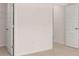 Bedroom featuring two doors and access to a walk-in closet at 1950 Van Allen Ct, Dacula, GA 30019