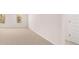 Large bedroom with neutral carpet and trim, and large windows at 1950 Van Allen Ct, Dacula, GA 30019