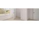 Bright bedroom with a large window offering natural light and a closet at 1950 Van Allen Ct, Dacula, GA 30019