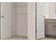 Walk in closet with wire shelving, and neutral walls and trim at 1950 Van Allen Ct, Dacula, GA 30019