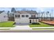 Charming two-story home with a two-car garage, well-manicured lawn, and traditional architectural details at 1950 Van Allen Ct, Dacula, GA 30019