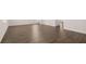 Spacious living room with dark hardwood floors and neutral walls providing a blank canvas at 1950 Van Allen Ct, Dacula, GA 30019