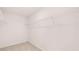 Spacious walk-in closet with carpet and shelving for optimal storage and organization at 1950 Van Allen Ct, Dacula, GA 30019