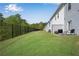 Spacious backyard with a well-manicured lawn and a fenced perimeter at 218 Jordan Dr, Woodstock, GA 30188