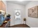 Well-lit foyer featuring elegant decor, a stylish dresser, and neutral-toned artwork at 218 Jordan Dr, Woodstock, GA 30188