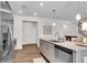 Kitchen island with granite countertops and stainless steel appliances in an open-concept layout at 218 Jordan Dr, Woodstock, GA 30188