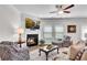 Cozy living room featuring a fireplace, plush seating, and contemporary decor for a relaxing atmosphere at 218 Jordan Dr, Woodstock, GA 30188