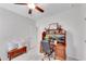 Home office setup with desk, monitors, and storage bench at 218 Jordan Dr, Woodstock, GA 30188