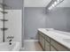 Standard bathroom with tub/shower combo and long vanity with double sinks at 260 Lamplighter Se Ln, Marietta, GA 30067