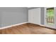 Bedroom showcasing wood-look floors, a closet, and a door to the outside at 260 Lamplighter Se Ln, Marietta, GA 30067