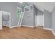 Bright living room with a ladder to a loft area and high ceilings at 260 Lamplighter Se Ln, Marietta, GA 30067