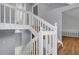 Beautiful bright staircase with white railing and wood steps and flooring at 260 Lamplighter Se Ln, Marietta, GA 30067