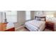 Inviting bedroom with wood-look floors, natural light, and modern decor at 2628 Hickory Trl, Snellville, GA 30078