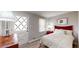 Charming bedroom with a wooden bedframe and decor lamp at 2628 Hickory Trl, Snellville, GA 30078