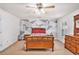 Bedroom featuring geometric accent wall, and traditional furnishings at 130 Honey Ln, Fayetteville, GA 30214