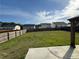 Expansive backyard with ample space and a partially covered patio area for outdoor enjoyment at 419 Woodmill Way, Atlanta, GA 30331