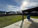 Partially covered patio and spacious backyard, ideal for outdoor activities and relaxation at 419 Woodmill Way, Atlanta, GA 30331