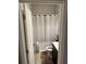 This is a bathroom with a toilet and shower at 419 Woodmill Way, Atlanta, GA 30331