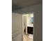 Bathroom with toilet, vanity, mirror, and tile flooring at 419 Woodmill Way, Atlanta, GA 30331