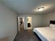 Bedroom features neutral wall colors and ensuite bathroom access at 419 Woodmill Way, Atlanta, GA 30331