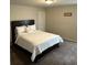Bedroom features neutral wall colors, carpet, and bright natural light at 419 Woodmill Way, Atlanta, GA 30331