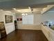 Elegant dining room with coffered ceiling and hardwood floors at 419 Woodmill Way, Atlanta, GA 30331