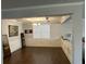 Elegant dining area with coffered ceiling, wainscoting, and large windows for ample natural light at 419 Woodmill Way, Atlanta, GA 30331