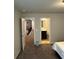 Hallway view into the bedroom and bathroom of the property at 419 Woodmill Way, Atlanta, GA 30331