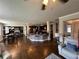 Open-concept kitchen with a central island, seamlessly blending into the living and dining areas at 419 Woodmill Way, Atlanta, GA 30331