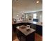 Open concept kitchen with granite countertops and stainless steel appliances at 419 Woodmill Way, Atlanta, GA 30331