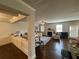 Cozy living room with fireplace, seamlessly connected to the kitchen at 419 Woodmill Way, Atlanta, GA 30331