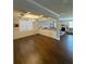Spacious living room showcasing an open floor plan, hardwood floors, and elegant trim work at 419 Woodmill Way, Atlanta, GA 30331