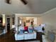 Bright living room featuring neutral paint, hardwood floors, and comfortable seating with stylish decor at 419 Woodmill Way, Atlanta, GA 30331