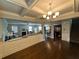 View of open-concept living room, dining room, and kitchen area at 419 Woodmill Way, Atlanta, GA 30331