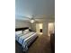 Comfortable bedroom with ensuite bathroom access, neutral colors and ceiling fan at 419 Woodmill Way, Atlanta, GA 30331
