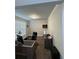 Bright and functional home office space with ample natural light and modern decor at 419 Woodmill Way, Atlanta, GA 30331