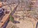 An aerial view of a large backyard with mature trees and a wooden fence at 4213 Bretdale Nw Run, Kennesaw, GA 30152