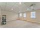 Open basement with media projector, door, carpet and natural light at 4213 Bretdale Nw Run, Kennesaw, GA 30152