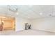 Expansive basement area with recessed lights, projector, and media setup at 4213 Bretdale Nw Run, Kennesaw, GA 30152