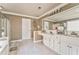Spacious bathroom featuring a shower, and double vanity with a large mirror at 4213 Bretdale Nw Run, Kennesaw, GA 30152