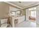 Bright bathroom with double vanity, large mirror, and toilet at 4213 Bretdale Nw Run, Kennesaw, GA 30152