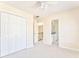 Bedroom features a ceiling fan, large closet, and ensuite bathroom access at 4213 Bretdale Nw Run, Kennesaw, GA 30152
