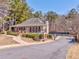 Inviting community clubhouse with a covered porch and well-maintained landscaping at 4213 Bretdale Nw Run, Kennesaw, GA 30152