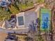 Aerial view showcasing a community pool, parking area, and tennis court at 4213 Bretdale Nw Run, Kennesaw, GA 30152