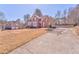 Beautiful two-story home with brick facade and well-maintained landscaping at 4213 Bretdale Nw Run, Kennesaw, GA 30152