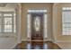Elegant foyer showcasing hardwood floors, large windows, and an open floor plan at 4213 Bretdale Nw Run, Kennesaw, GA 30152