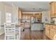 Bright kitchen with stainless steel appliances, island, and wood cabinetry at 4213 Bretdale Nw Run, Kennesaw, GA 30152